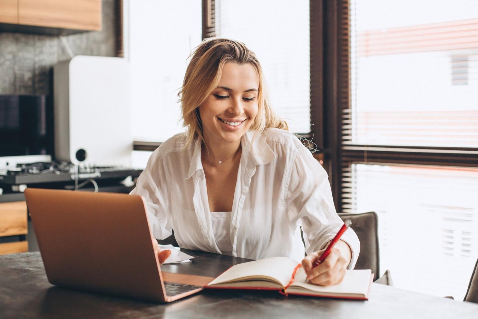 Person reviewing financial documents and planning budget